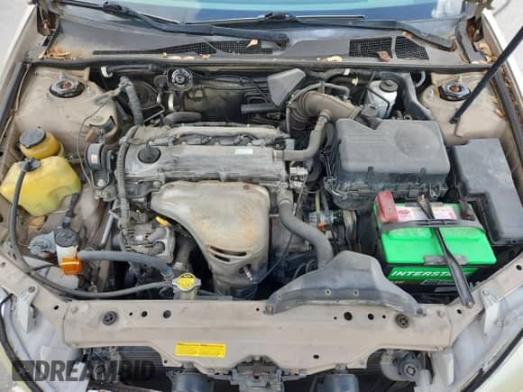 2002 Toyota Camry LE z VIN JTDBE32K020068442, wystawiony jako Copart lot #85160605 z przebiegiem Nie podano mil oraz Szkoda całkowita • Salvage title. Historia ofert i sprzedaży dostępna na DreamBid. Obrazek 11.