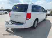 2019 Dodge Grand Caravan SXT with VIN 2C4RDGCG4KR617505, listed as a IAAI auction lot 42985085 with 100,245 mi miles and . Bid and sale history available at DreamBid. Image 4.