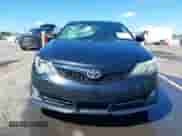 2014 Toyota Camry SE with VIN 4T1BF1FK3EU386026, listed as a IAAI auction lot 43245647 with 141,769 mi miles and . Bid and sale history available at DreamBid. Image 12.