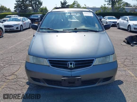 2002 Honda Odyssey LX with VIN 2HKRL18582H553425, listed as a IAAI auction lot 42691711 with 272,751 mi miles and . Bid and sale history available at DreamBid. Image 12.