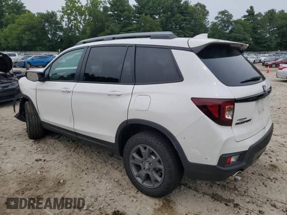2025 Honda Passport TrailSport with VIN 5FNYF8H66SB007774, listed as a Copart auction lot 67819095 with 6,963 mi miles and Salvage title. Bid and sale history available at DreamBid. Image 2.