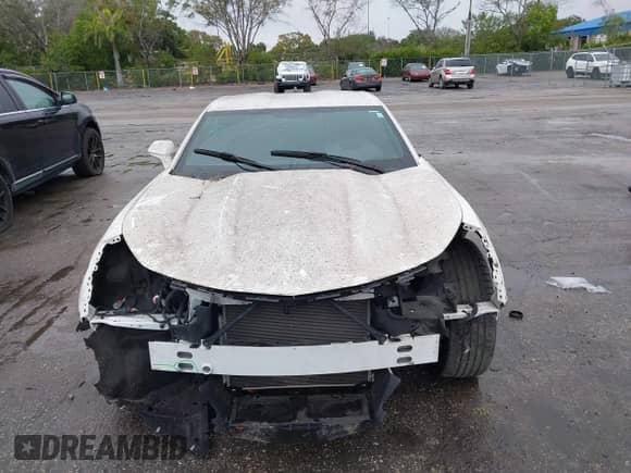 2021 Chevrolet Camaro 1LT с VIN 1G1FB1RX4M0142120, выставлен на аукционе IAAI как лот 41394658 с пробегом 25 477 миль миль и . История ставок и продаж доступна на DreamBid. Изображение 12.