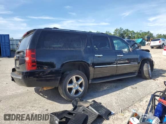 2013 Chevrolet Suburban LTZ z VIN 1GNSKKE78DR291084, wystawiony jako Copart lot #68447505 z przebiegiem Nie podano mil oraz Szkoda całkowita • Salvage title. Historia ofert i sprzedaży dostępna na DreamBid. Obrazek 3.