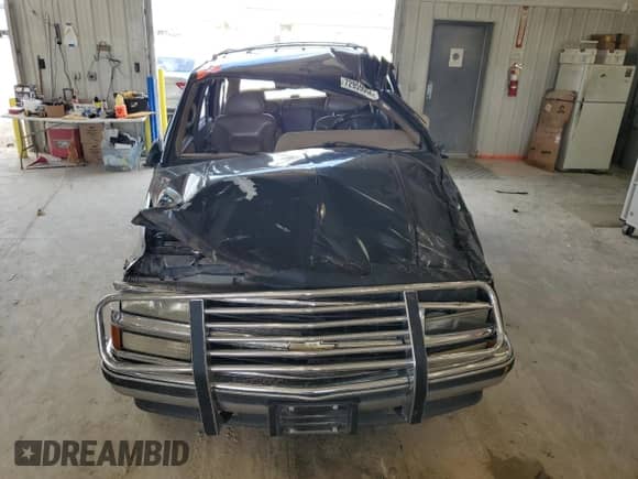 1995 Chevrolet Tahoe z VIN 1GNEK13K2SJ432421, wystawiony jako Copart lot #72959694 z przebiegiem Nie podano mil oraz Szkoda całkowita • Salvage title. Historia ofert i sprzedaży dostępna na DreamBid. Obrazek 13.