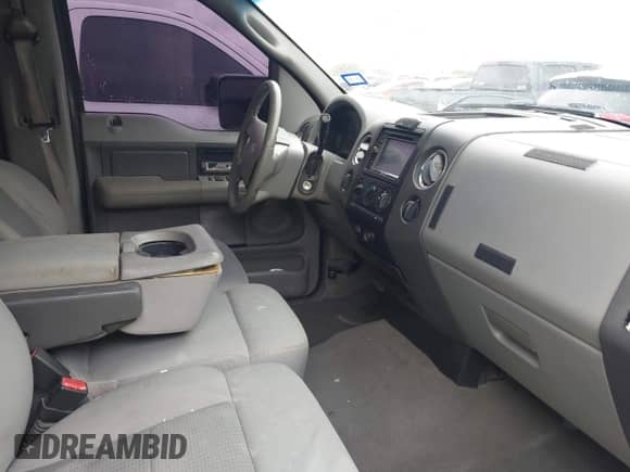 2007 Ford F-150 XLT with VIN 1FTRW14W47KD13710, listed as a IAAI auction lot 42025634 with 297,307 mi miles and . Bid and sale history available at DreamBid. Image 5.