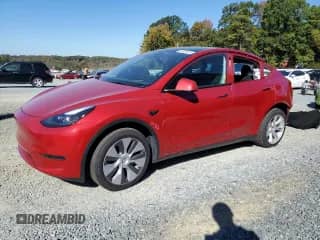 2024 Tesla Model Y Long Range with VIN 7SAYGDEE5RA217617, listed as a Copart auction lot 82626685 with 15,664 mi miles and Salvage title. Bid and sale history available at DreamBid. Image 1.
