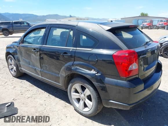 2011 Dodge Caliber Mainstreet with VIN 1B3CB3HAXBD156405, listed as a IAAI auction lot 42327317 with 93,355 mi miles and . Bid and sale history available at DreamBid. Image 3.