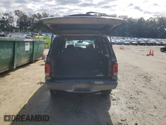 2000 Ford Explorer Limited with VIN 1FMDU75E9YUB50157, listed as a Copart auction lot 88743875 with 184,376 mi miles and Salvage title. Bid and sale history available at DreamBid. Image 6.