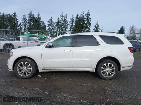 2016 Dodge Durango Citadel with VIN 1C4RDJEG8GC403479, listed as a IAAI auction lot 41209973 with 132,679 mi miles and . Bid and sale history available at DreamBid. Image 14.