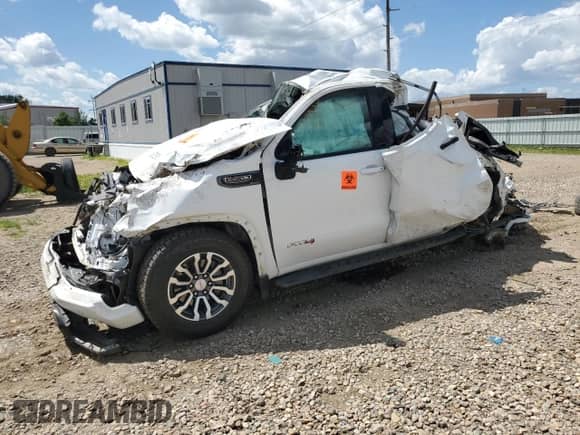 2023 GMC Sierra 1500 AT4 with VIN 1GTUUEEL0PZ328126, listed as a Copart auction lot 65720915 with Not provided miles and Salvage title. Bid and sale history available at DreamBid. Image 1.