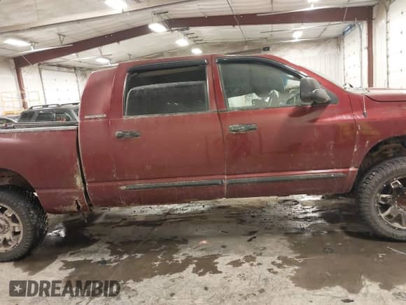 2007 Dodge 2500 Laramie with VIN 3D7KS29C57G731966, listed as a IAAI auction lot 41373936 with 239,931 mi miles and . Bid and sale history available at DreamBid. Image 13.