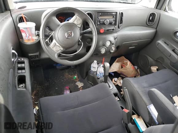 2012 Nissan Cube SL с VIN JN8AZ2KR1CT250372, выставлен на аукционе Copart как лот 65542425 с пробегом 128 187 миль миль и Списание • Salvage title. История ставок и продаж доступна на DreamBid. Изображение 8.