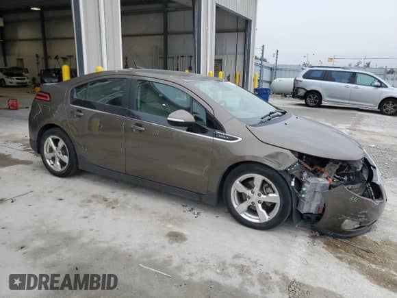 2014 Chevrolet Volt с VIN 1G1RD6E49EU160896, выставлен на аукционе Copart как лот 86319185 с пробегом 78 123 миль миль и Списание • Salvage title. История ставок и продаж доступна на DreamBid. Изображение 4.