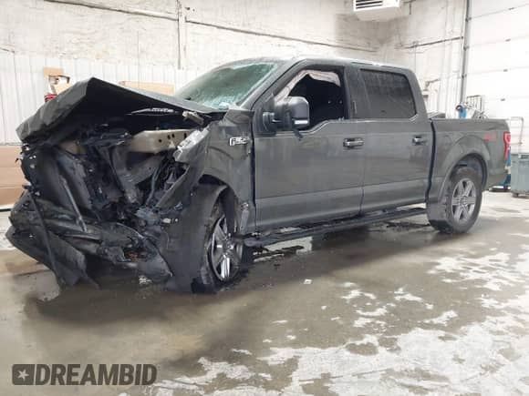 2018 Ford F-150 XLT z VIN 1FTEW1EP2JFD27417, wystawiony jako IAAI lot #43161869 z przebiegiem 93 300 mil mil oraz . Historia ofert i sprzedaży dostępna na DreamBid. Obrazek 17.