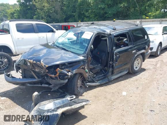 2002 Dodge Durango Sport with VIN 1B4HS38N32F183552, listed as a IAAI auction lot 42931638 with 295,511 mi miles and . Bid and sale history available at DreamBid. Image 2.