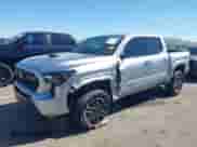 2024 Toyota Tacoma SR5 with VIN 3TMKB5FN2RM001972, listed as a IAAI auction lot 43362889 with 21,644 mi miles and . Bid and sale history available at DreamBid. Image 2.