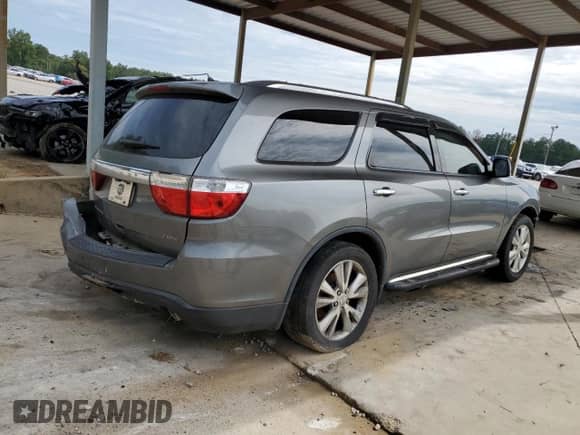 2013 Dodge Durango Crew with VIN 1C4RDHDG1DC508595, listed as a Copart auction lot 70738445 with 135,209 mi miles and Salvage title. Bid and sale history available at DreamBid. Image 3.