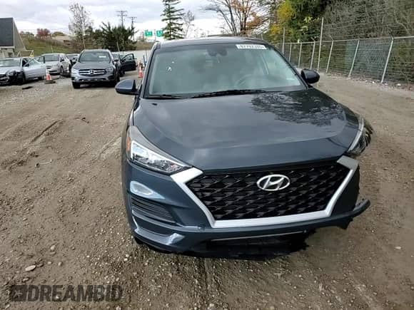 2020 Hyundai Tucson SE with VIN KM8J2CA47LU167854, listed as a Copart auction lot 82702345 with 123,452 mi miles and Salvage title. Bid and sale history available at DreamBid. Image 14.