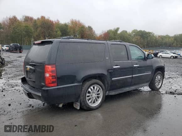 2012 Chevrolet Suburban LTZ z VIN 1GNSKKE74CR234444, wystawiony jako Copart lot #85596655 z przebiegiem 223 614 mil mil oraz Szkoda całkowita • Salvage title. Historia ofert i sprzedaży dostępna na DreamBid. Obrazek 3.