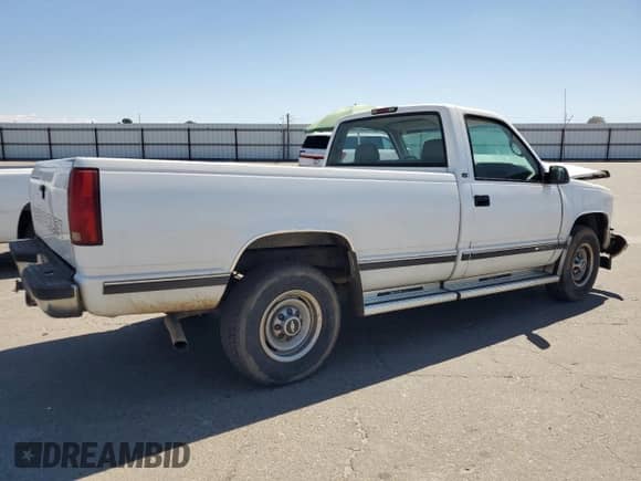 1997 Chevrolet Silverado 2500 z VIN 1GCGC24R6VZ242630, wystawiony jako Copart lot #66902425 z przebiegiem 128 508 mil mil oraz Szkoda całkowita • Salvage title. Historia ofert i sprzedaży dostępna na DreamBid. Obrazek 3.