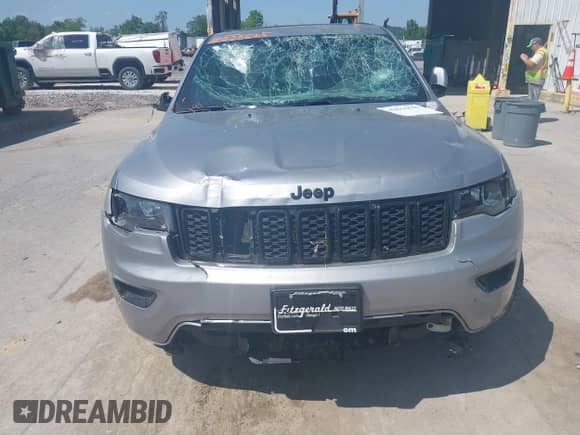 2017 Jeep Grand Cherokee Altitude with VIN 1C4RJFAG2HC714631, listed as a IAAI auction lot 42556625 with 89,662 mi miles and . Bid and sale history available at DreamBid. Image 6.