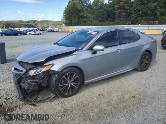 2020 Toyota Camry SE with VIN 4T1G11AK5LU873673, listed as a Copart auction lot 82445535 with 86,477 mi miles and Salvage title. Bid and sale history available at DreamBid. Image 1.
