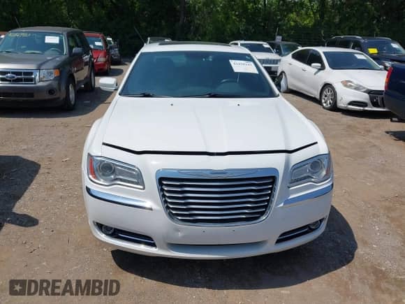 2013 Chrysler 300 with VIN 2C3CCARGXDH669215, listed as a IAAI auction lot 42458243 with 156,880 mi miles and . Bid and sale history available at DreamBid. Image 12.