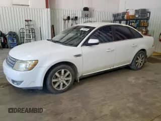 2008 Ford Taurus SEL with VIN 1FAHP24W58G131524, listed as a Copart auction lot 71653585 with 169,998 mi miles and Salvage title. Bid and sale history available at DreamBid. Image 1.