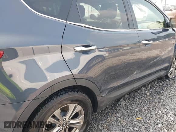 2014 Hyundai Santa Fe with VIN 5XYZUDLB5EG153555, listed as a IAAI auction lot 43145430 with 140,750 mi miles and . Bid and sale history available at DreamBid. Image 18.