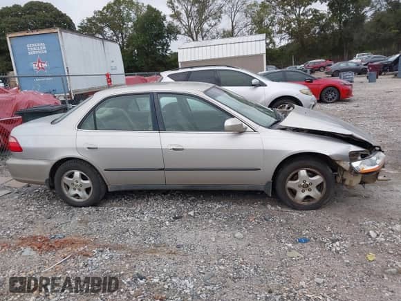 1999 Honda Accord LX with VIN 1HGCG1646XA061013, listed as a IAAI auction lot 43344192 with 147,494 mi miles and . Bid and sale history available at DreamBid. Image 13.