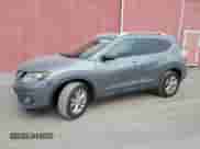 2015 Nissan Rogue SL z VIN 5N1AT2MVXFC874436, wystawiony jako Copart lot #82303885 z przebiegiem 257 237 mil mil oraz Czysty tytuł • Clean title. Historia ofert i sprzedaży dostępna na DreamBid. Obrazek 1.