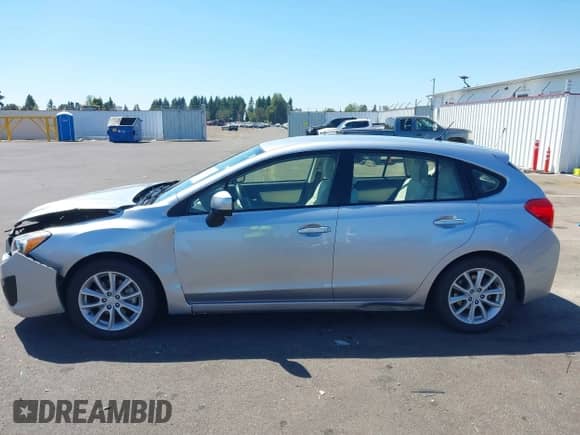 2014 Subaru Impreza Premium with VIN JF1GPAC63E8291981, listed as a IAAI auction lot 42842971 with 56,343 mi miles and . Bid and sale history available at DreamBid. Image 14.