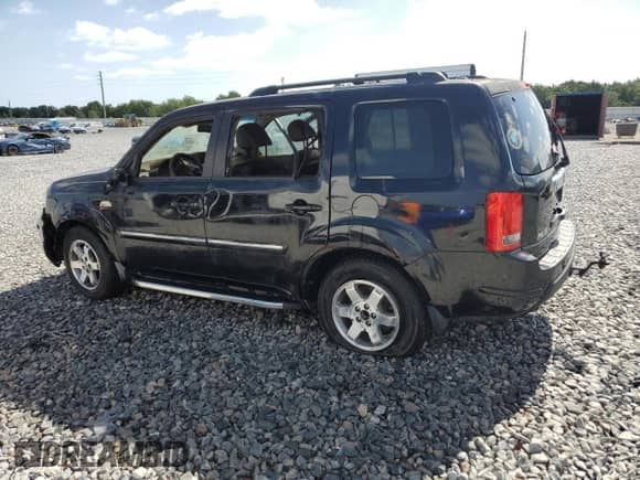 2010 Honda Pilot Touring with VIN 5FNYF3H9XAB005148, listed as a Copart auction lot 55065195 with Not provided miles and Salvage title. Bid and sale history available at DreamBid. Image 2.