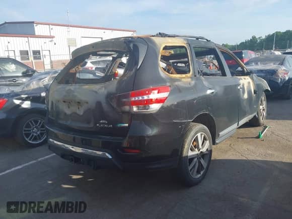 2014 Nissan Pathfinder Platinum Hybrid with VIN 5N1CR2MM4EC638247, listed as a IAAI auction lot 42067363 with Not provided miles and . Bid and sale history available at DreamBid. Image 4.