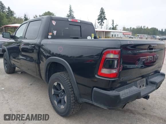2019 Ram 1500 Rebel z VIN 1C6SRFLTXKN602649, wystawiony jako IAAI lot #42780134 z przebiegiem 149 750 mil mil oraz . Historia ofert i sprzedaży dostępna na DreamBid. Obrazek 3.