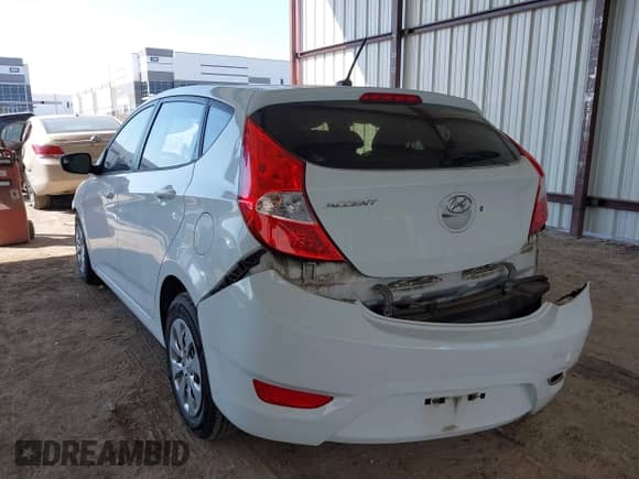 2015 Hyundai Accent GS z VIN KMHCT5AEXFU217791, wystawiony jako IAAI lot #43364438 z przebiegiem 74 167 mil mil oraz . Historia ofert i sprzedaży dostępna na DreamBid. Obrazek 3.