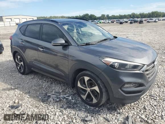 2016 Hyundai Tucson Eco with VIN KM8J33A22GU049583, listed as a Copart auction lot 71206935 with 135,066 mi miles and Clean title. Bid and sale history available at DreamBid. Image 4.