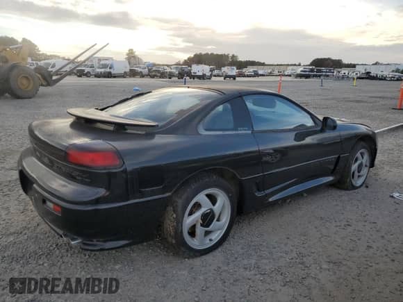 1991 Dodge Stealth with VIN JB3XE74C2MY017971, listed as a Copart auction lot 79442074 with 56,890 mi miles and Salvage title. Bid and sale history available at DreamBid. Image 3.