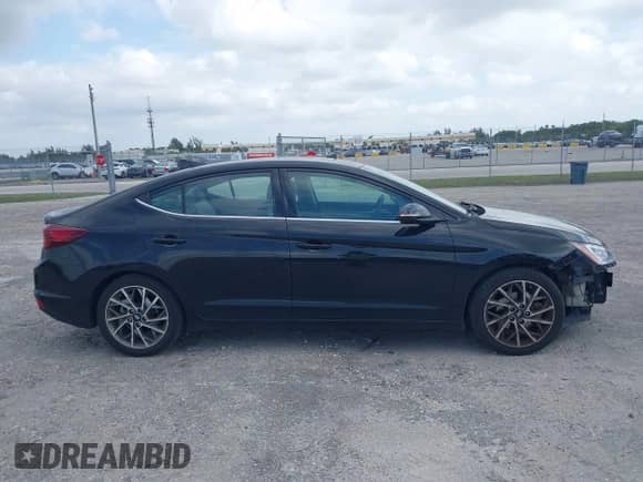 2020 Hyundai Elantra SEL z VIN 5NPD84LF5LH557432, wystawiony jako IAAI lot #42085363 z przebiegiem 74 081 mil mil oraz . Historia ofert i sprzedaży dostępna na DreamBid. Obrazek 14.