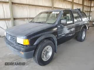 1995 Honda Passport with VIN 4S6CY58V4S4406803, listed as a Copart auction lot 73057084 with 161,118 mi miles and Salvage title. Bid and sale history available at DreamBid. Image 1.
