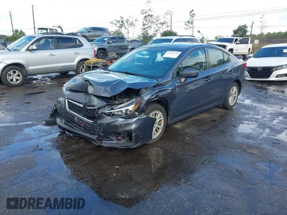 2017 Subaru Impreza Premium with VIN 4S3GKAD60H3623416, listed as a IAAI auction lot 43396228 with 106,514 mi miles and . Bid and sale history available at DreamBid. Image 2.