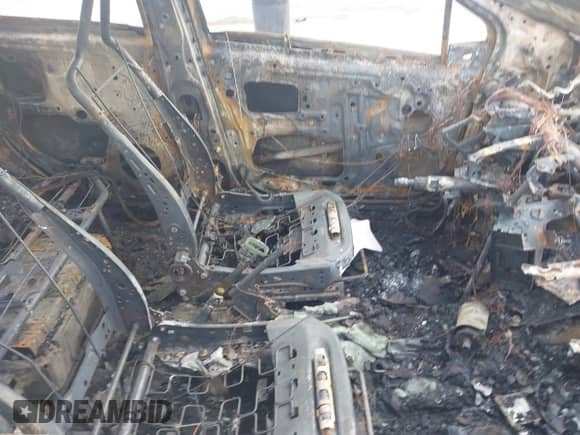 2014 Toyota Prius One with VIN JTDKDTB32E1061289, listed as a IAAI auction lot 42836175 with Not provided miles and . Bid and sale history available at DreamBid. Image 5.