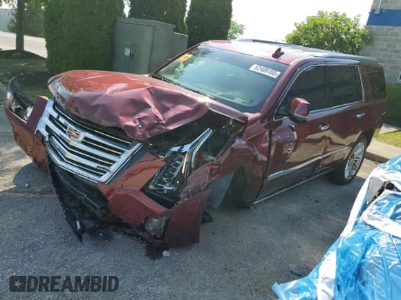 2020 Cadillac Escalade Platinum z VIN 1GYS4DKJ3LR171975, wystawiony jako Copart lot #62409165 z przebiegiem 38 297 mil mil oraz Szkoda całkowita • Salvage title. Historia ofert i sprzedaży dostępna na DreamBid. Obrazek 1.