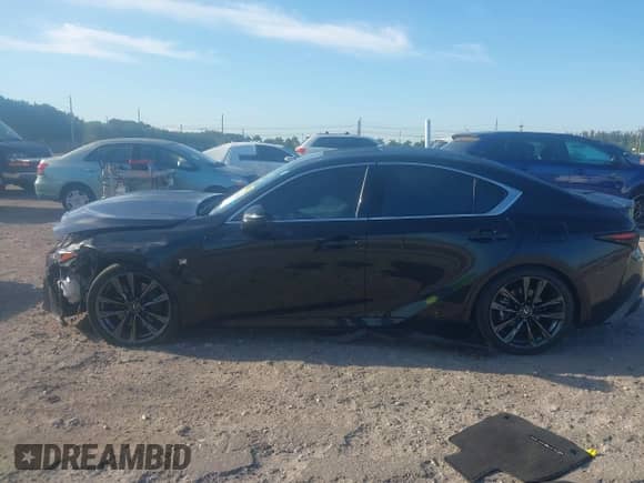 2023 Lexus IS 350 F Sport z VIN JTHGZ1B26P5067657, wystawiony jako IAAI lot #41894342 z przebiegiem 30 402 mil mil oraz . Historia ofert i sprzedaży dostępna na DreamBid. Obrazek 14.