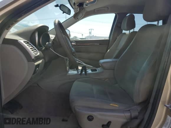 2012 Jeep Grand Cherokee Laredo z VIN 1C4RJEAG9CC177114, wystawiony jako Copart lot #70713065 z przebiegiem 105 759 mil mil oraz Czysty tytuł • Clean title. Historia ofert i sprzedaży dostępna na DreamBid. Obrazek 7.