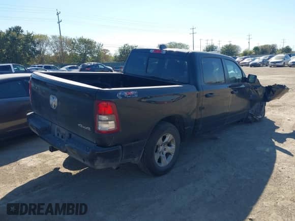 2023 Ram 1500 Tradesman z VIN 1C6SRFGT4PN657325, wystawiony jako IAAI lot #40932007 z przebiegiem 42 639 mil mil oraz . Historia ofert i sprzedaży dostępna na DreamBid. Obrazek 4.