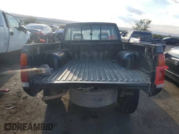 1993 Nissan Frontier SE с VIN 1N6HD16Y9PC398809, выставлен на аукционе Copart как лот 70628754 с пробегом 224 511 миль миль и Списание • Salvage title. История ставок и продаж доступна на DreamBid. Изображение 6.