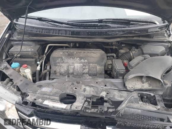 2016 Honda Odyssey Touring Elite z VIN 5FNRL5H92GB052661, wystawiony jako IAAI lot #43451962 z przebiegiem 145 569 mil mil oraz . Historia ofert i sprzedaży dostępna na DreamBid. Obrazek 10.