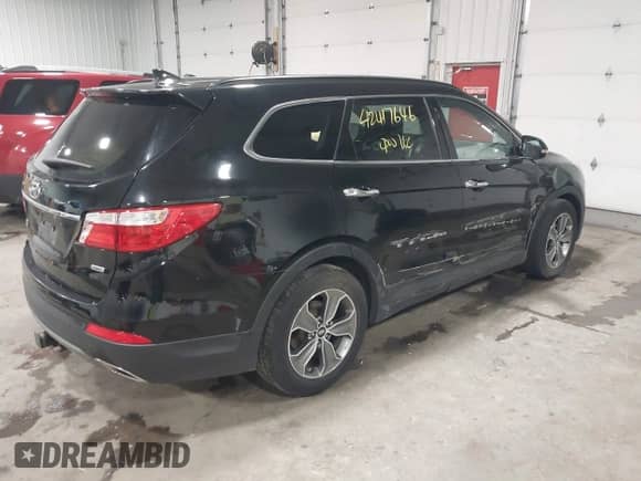 2014 Hyundai Santa Fe Limited with VIN KM8SNDHF2EU035158, listed as a IAAI auction lot 42417646 with 127,455 mi miles and . Bid and sale history available at DreamBid. Image 4.