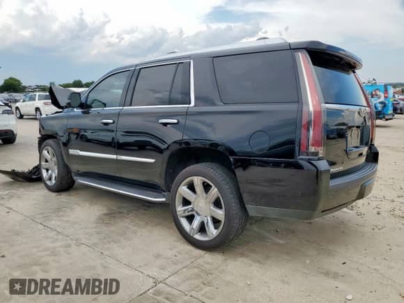 2020 Cadillac Escalade Premium Luxury с VIN 1GYS4CKJ0LR243080, выставлен на аукционе Copart как лот 68518165 с пробегом 88 399 миль миль и Списание • Salvage title. История ставок и продаж доступна на DreamBid. Изображение 2.